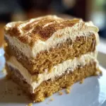 Pumpkin Spice Gooey Cake with Cream Cheese Frosting